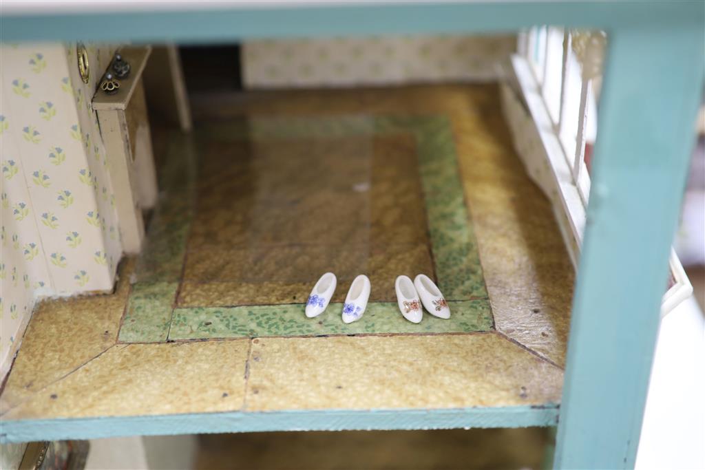 A 1940s dolls house, with contents from Compton Verney Warwickshire, width 63cm height 60cm